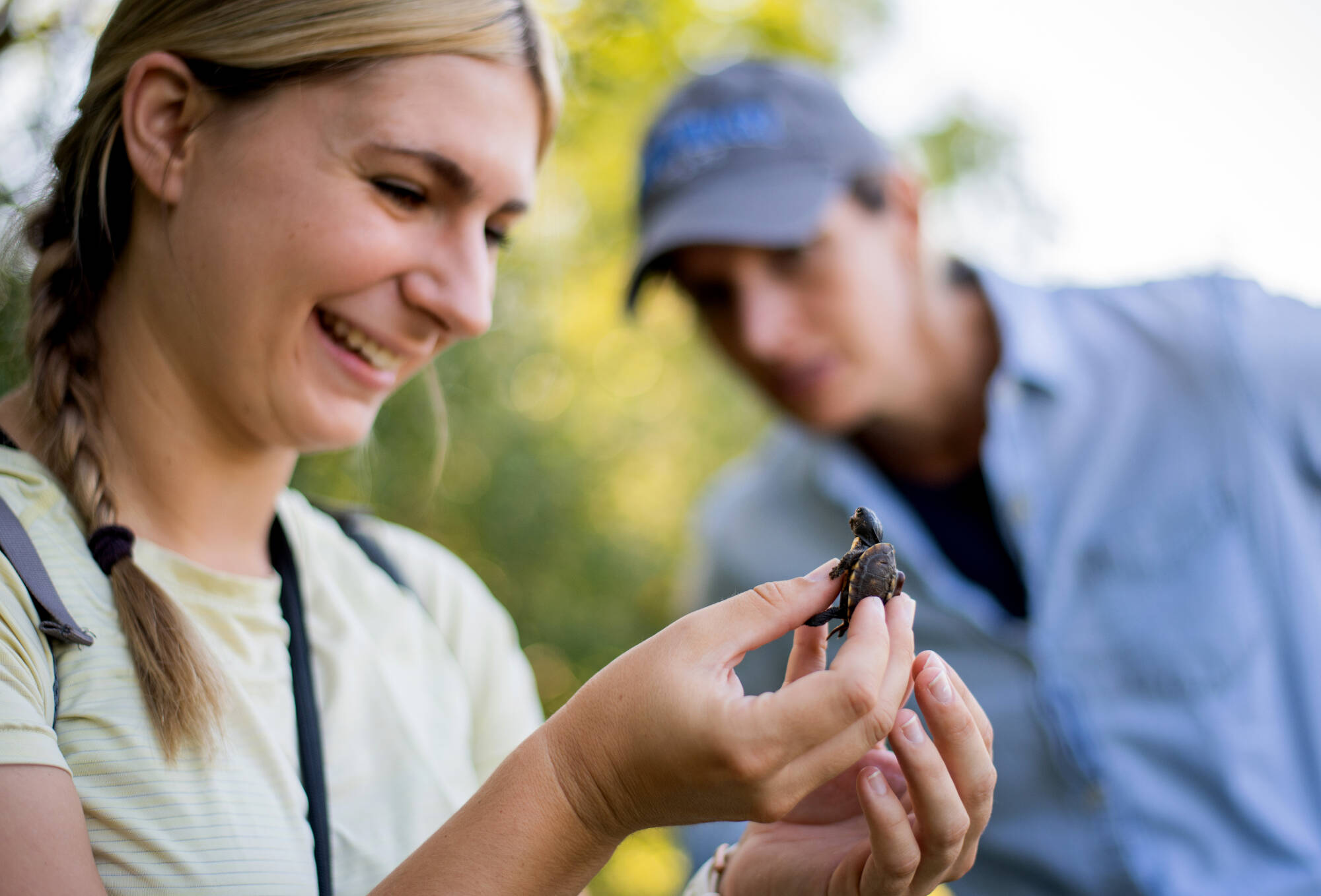 Biology student with professor.